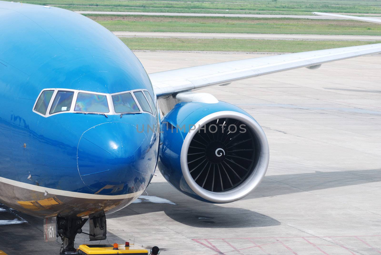 Plane in airport getting ready to fly