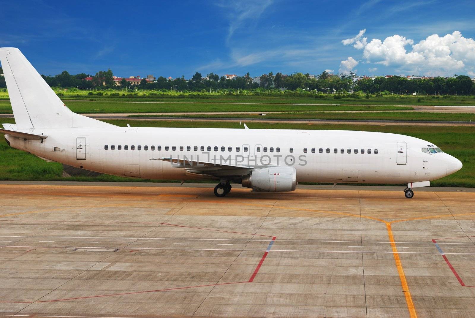 Airplane is taxing in airport getting ready to fly