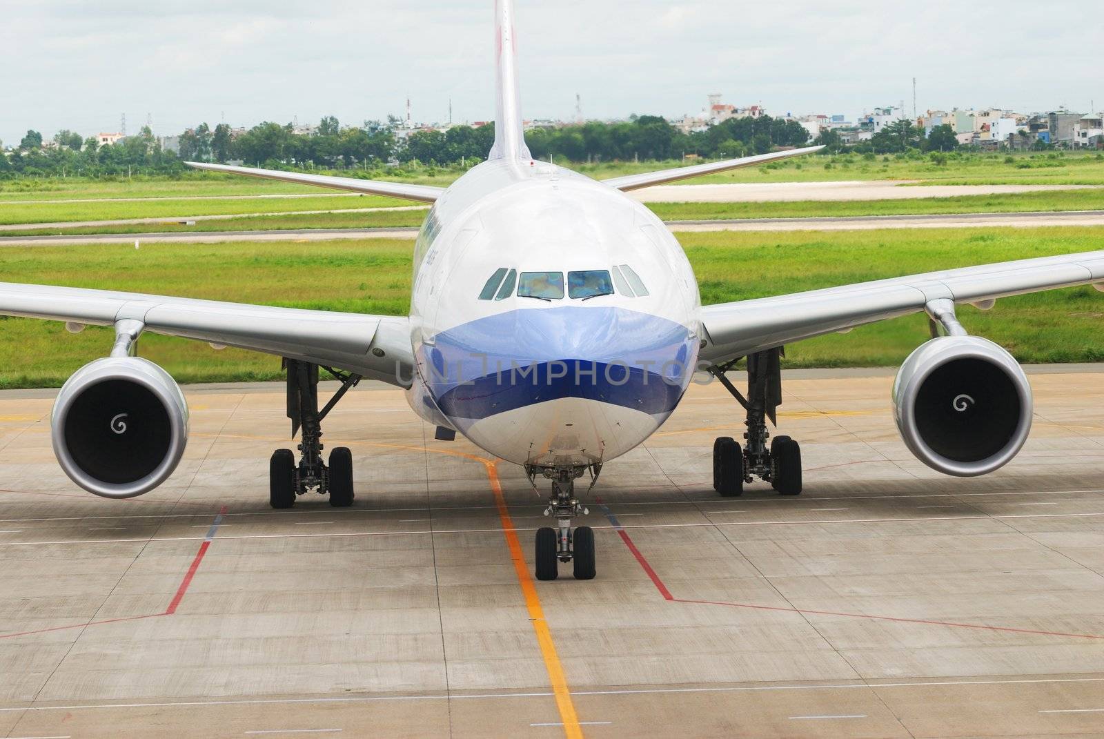 Airplane is taxing in airport getting ready to fly