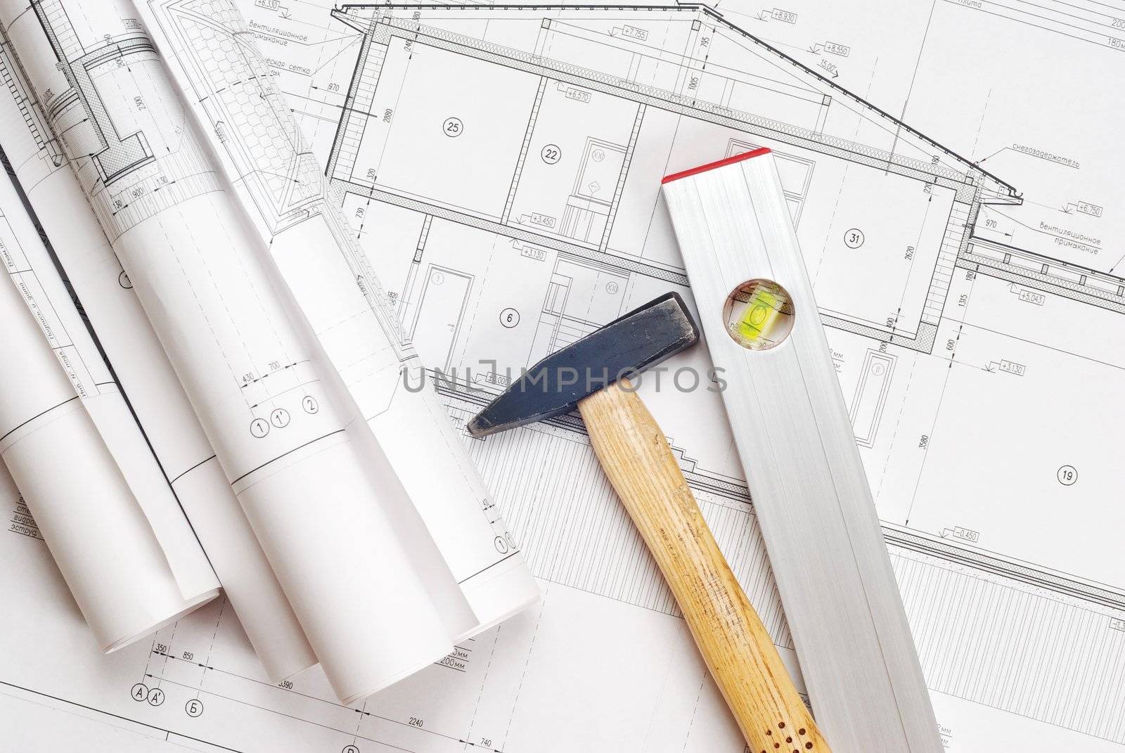 Tools over house plan blueprints