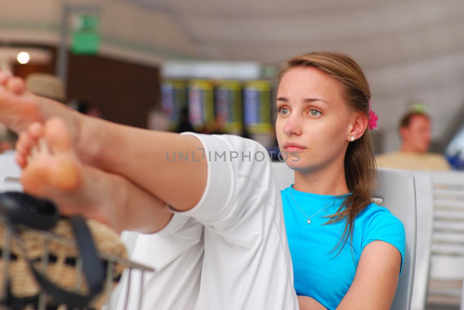 Woman waiting for a delayed flight