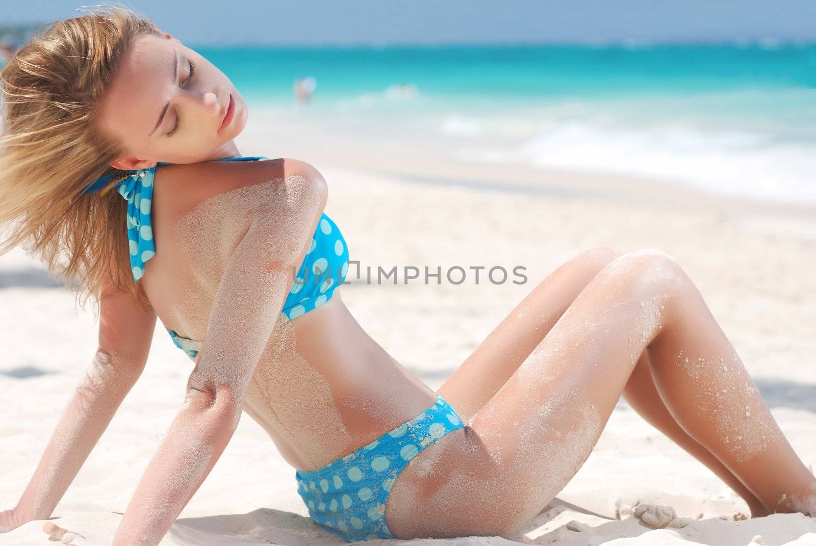 Bikini girl on caribbean beach