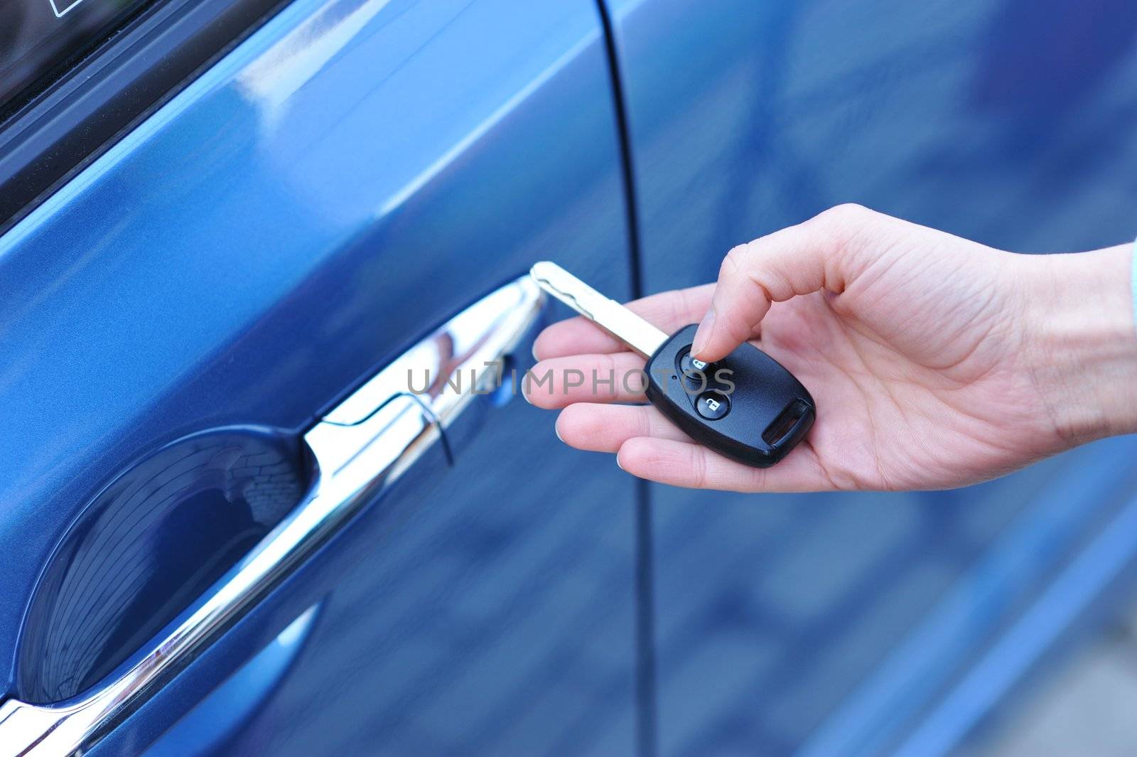 Car key in woman's hand