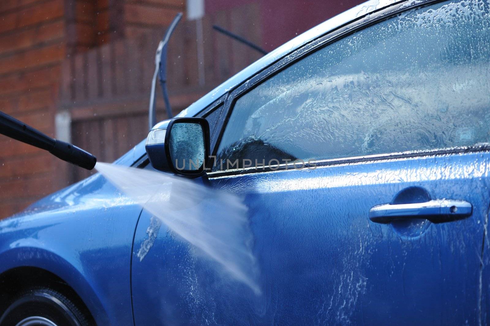 Blue car washing on open air