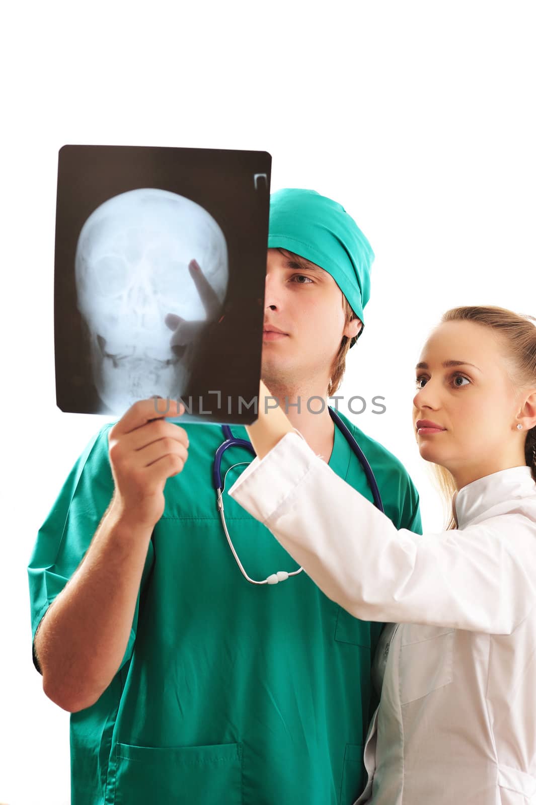 Doctors looking at x-ray by haveseen