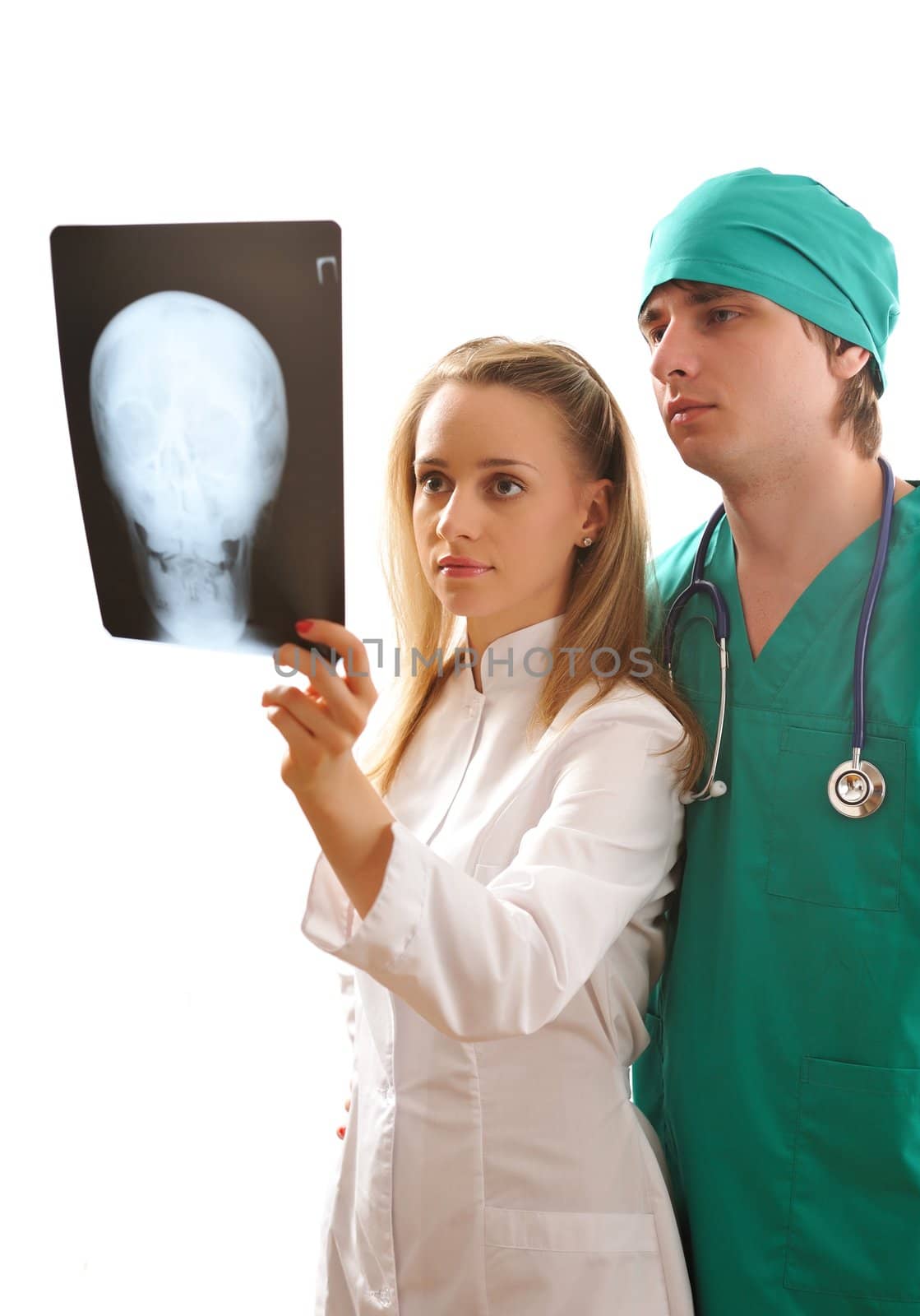 Doctors looking at x-ray (isolated on white)