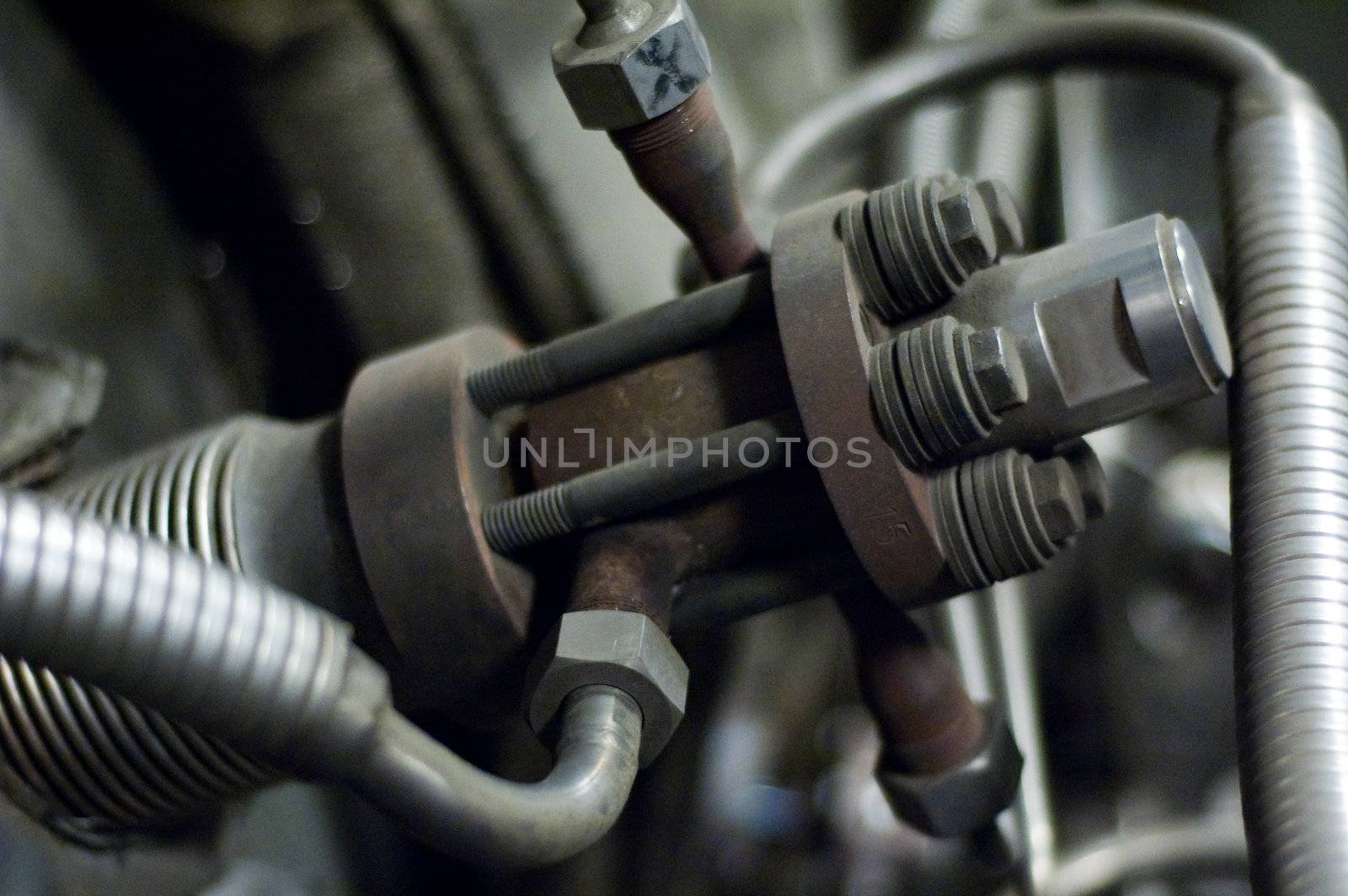 Steel valve inside a large industrial facility by edan