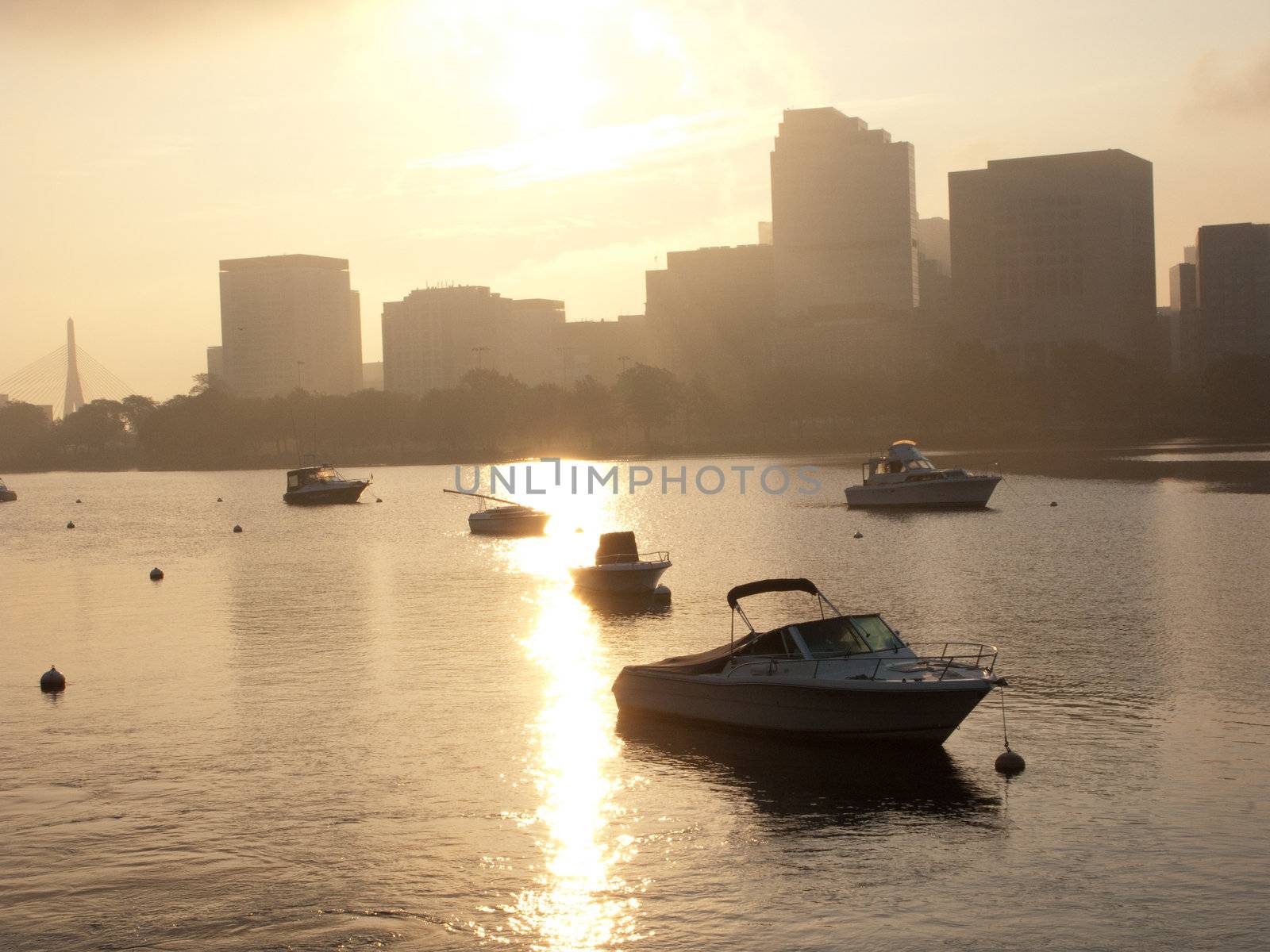 Motorboats anchored in the Charles River in Boston by edan