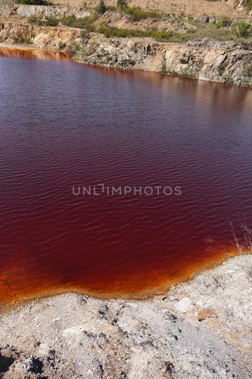 Polluted water pond in the abandoned mine of Lousal, Grandola, Portugal