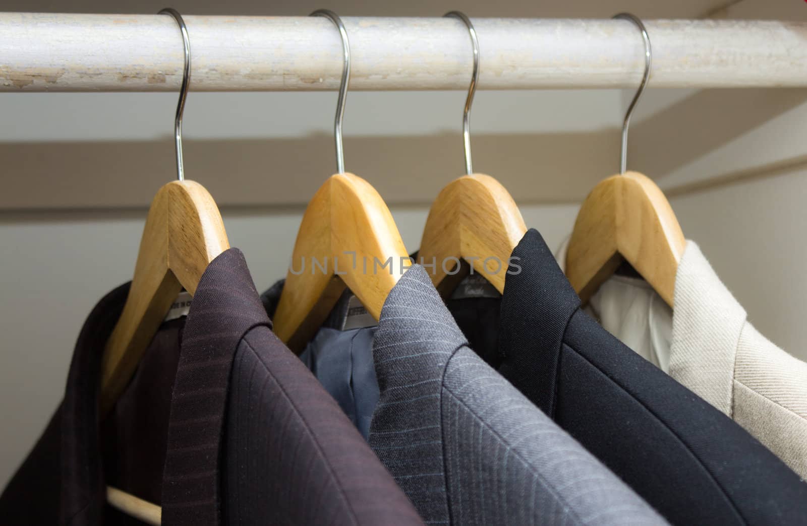 Business suits in the closet.