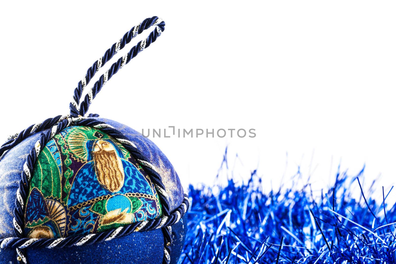 Italy. Traditional handmade Christmas ball made of white and blue fabric