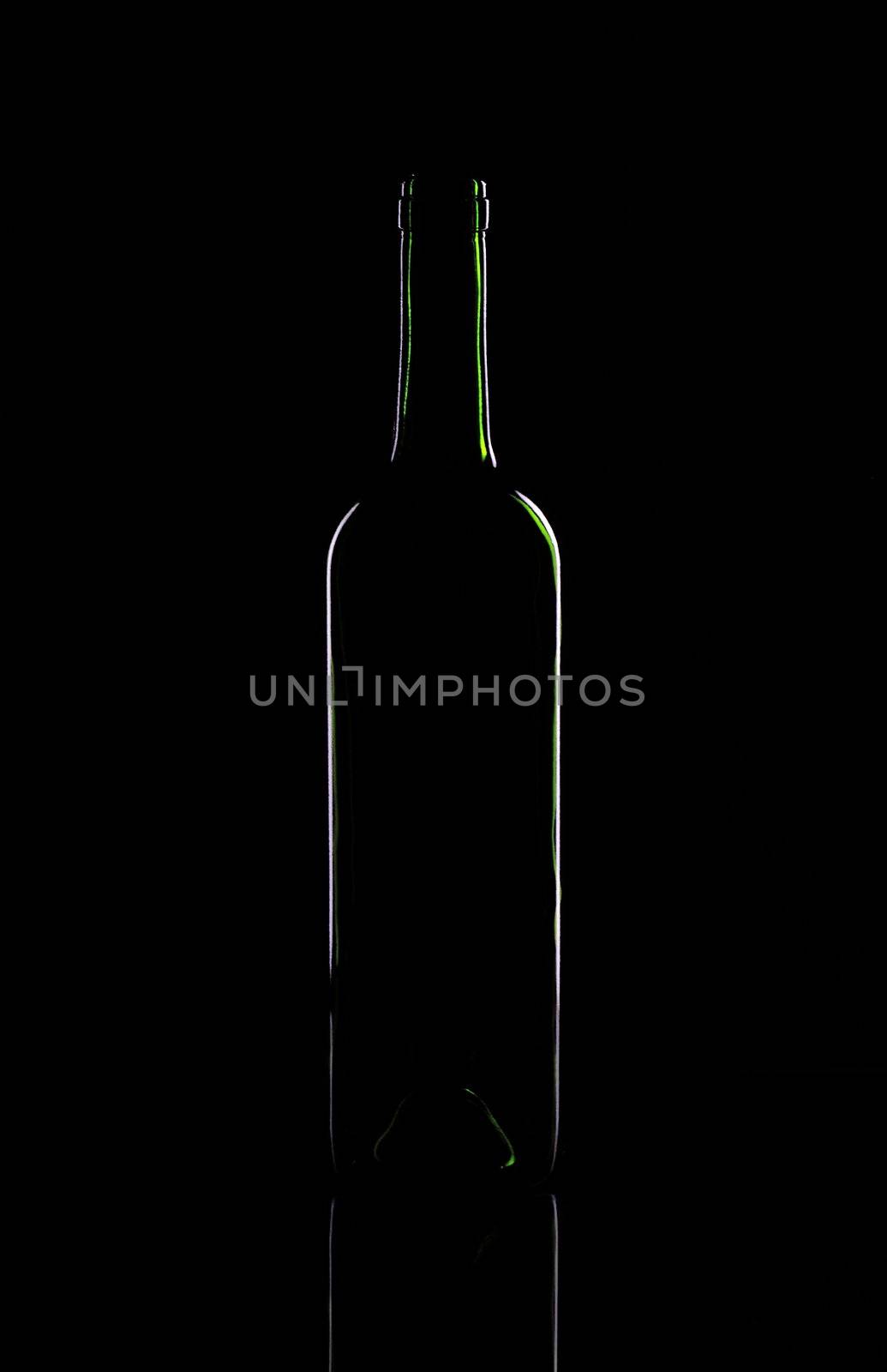 One wine bottle on a black background
