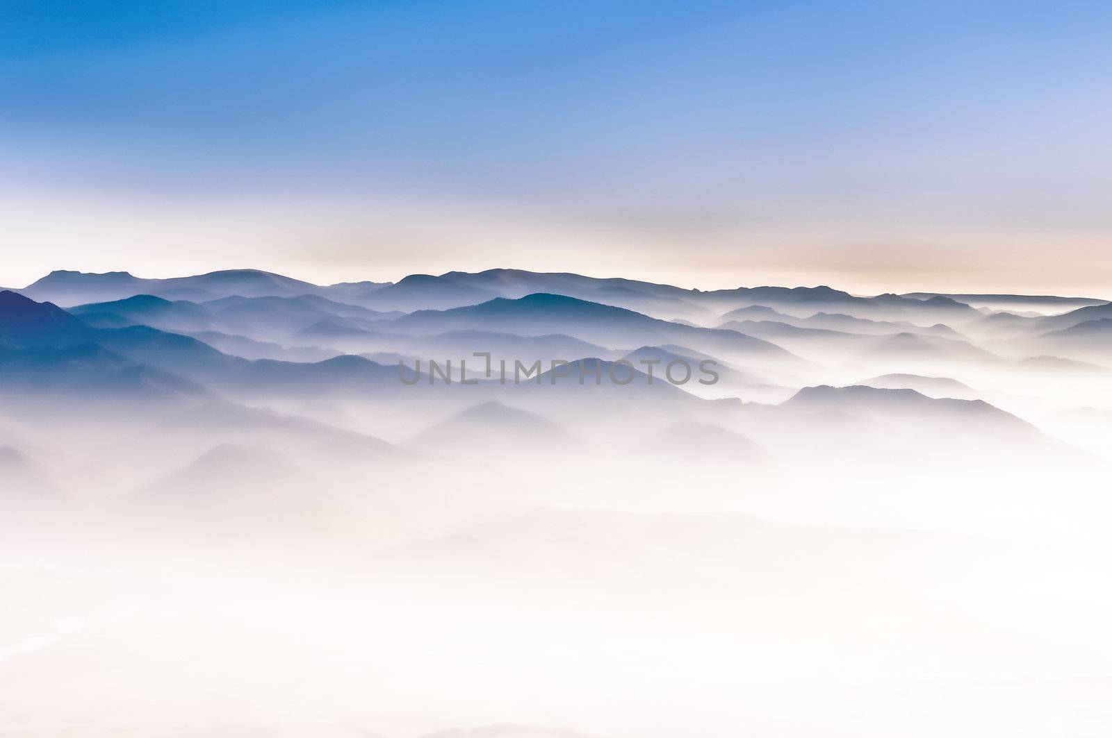 Misty mountain hills landscape detail view with foggy hills