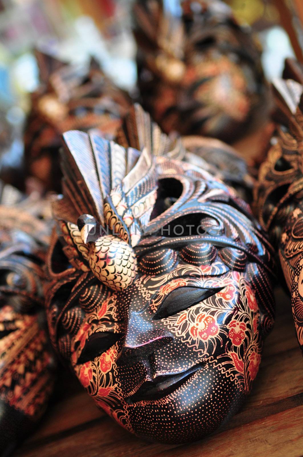 Balinese wooden masks detail close up of the hand crafted masks