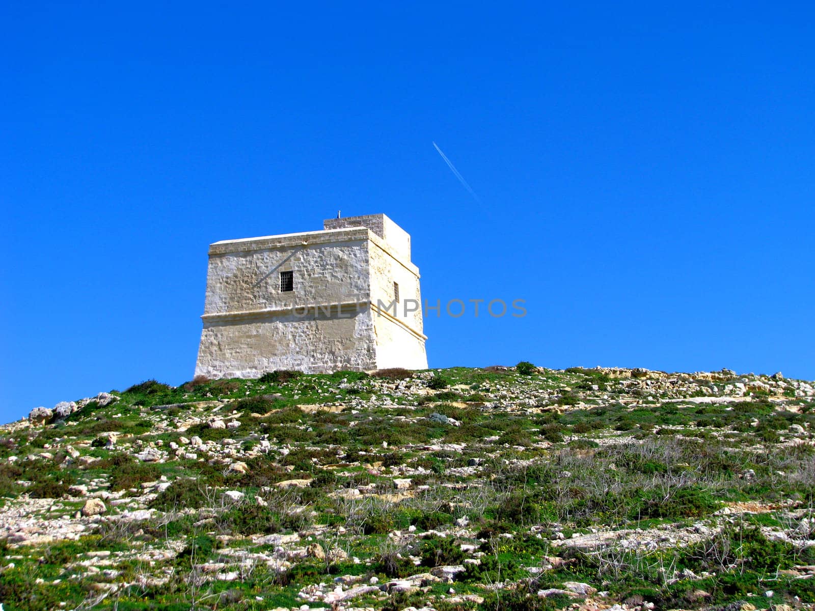 The Watch Tower overlooking the bay in Dwejra Gozo - Malta.
