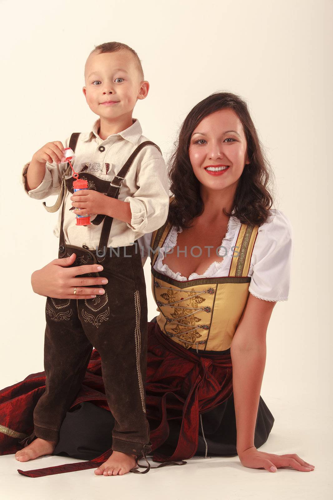 Single mother with her son in Bavarian costume