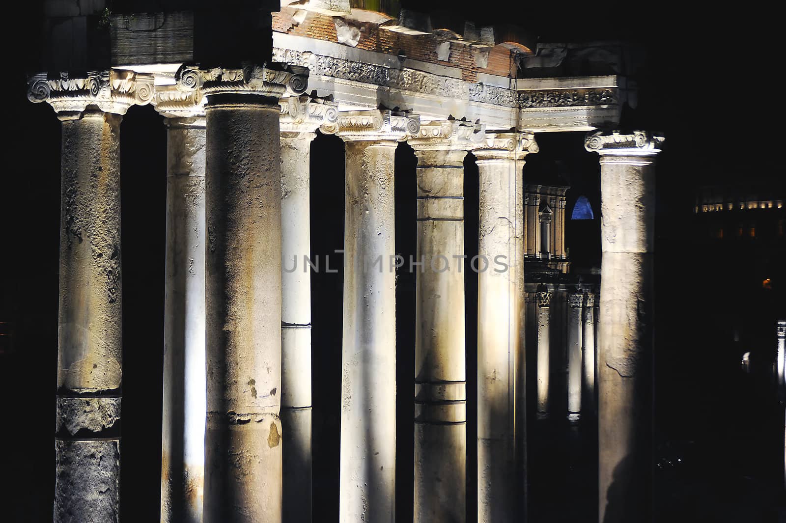 Roman columns light up in the dark night