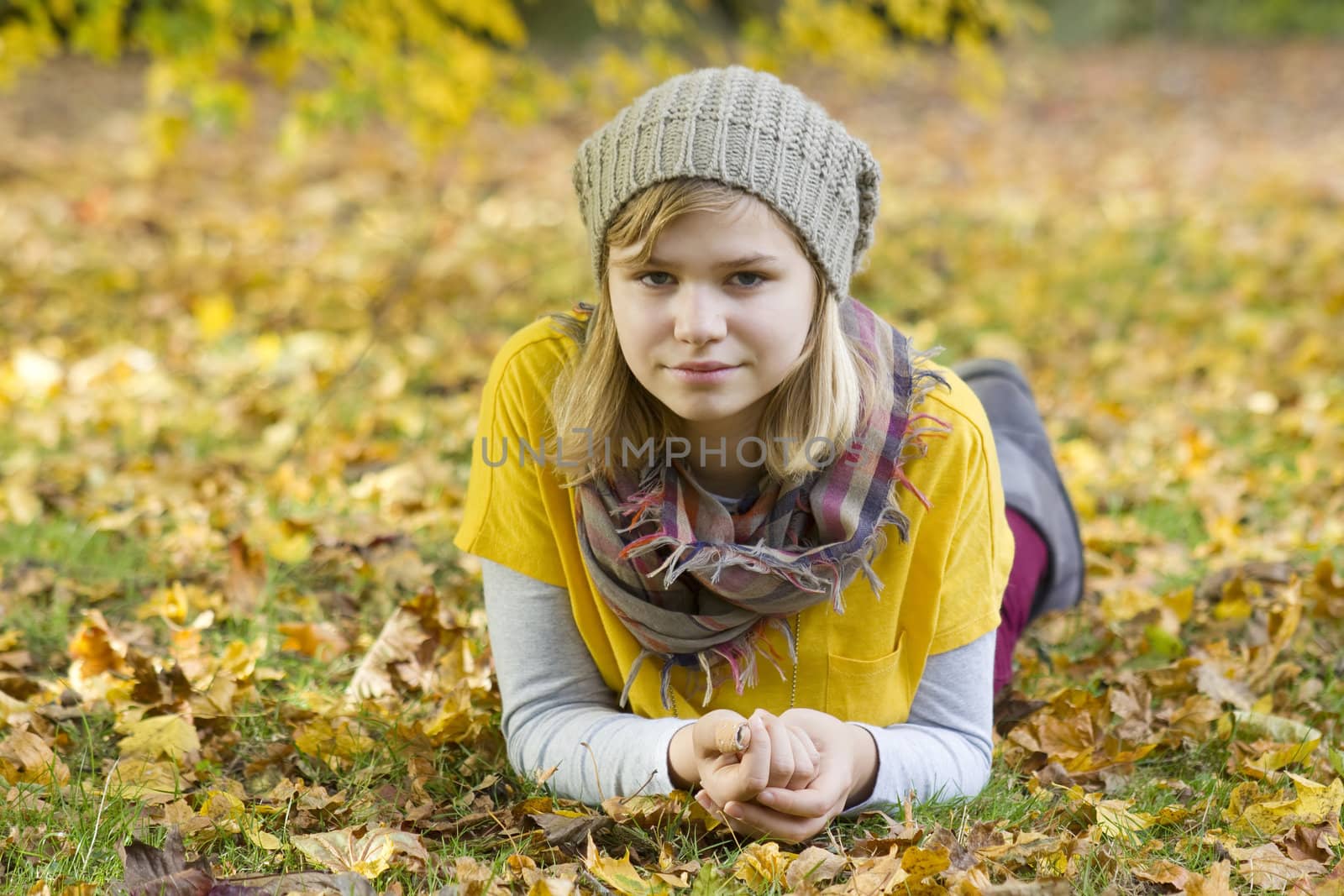 cute little girl in the autumn park by miradrozdowski