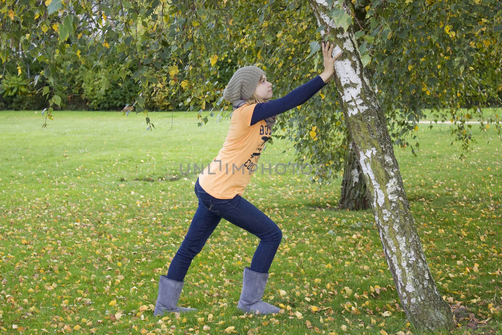 Cute girl playing in the park by miradrozdowski