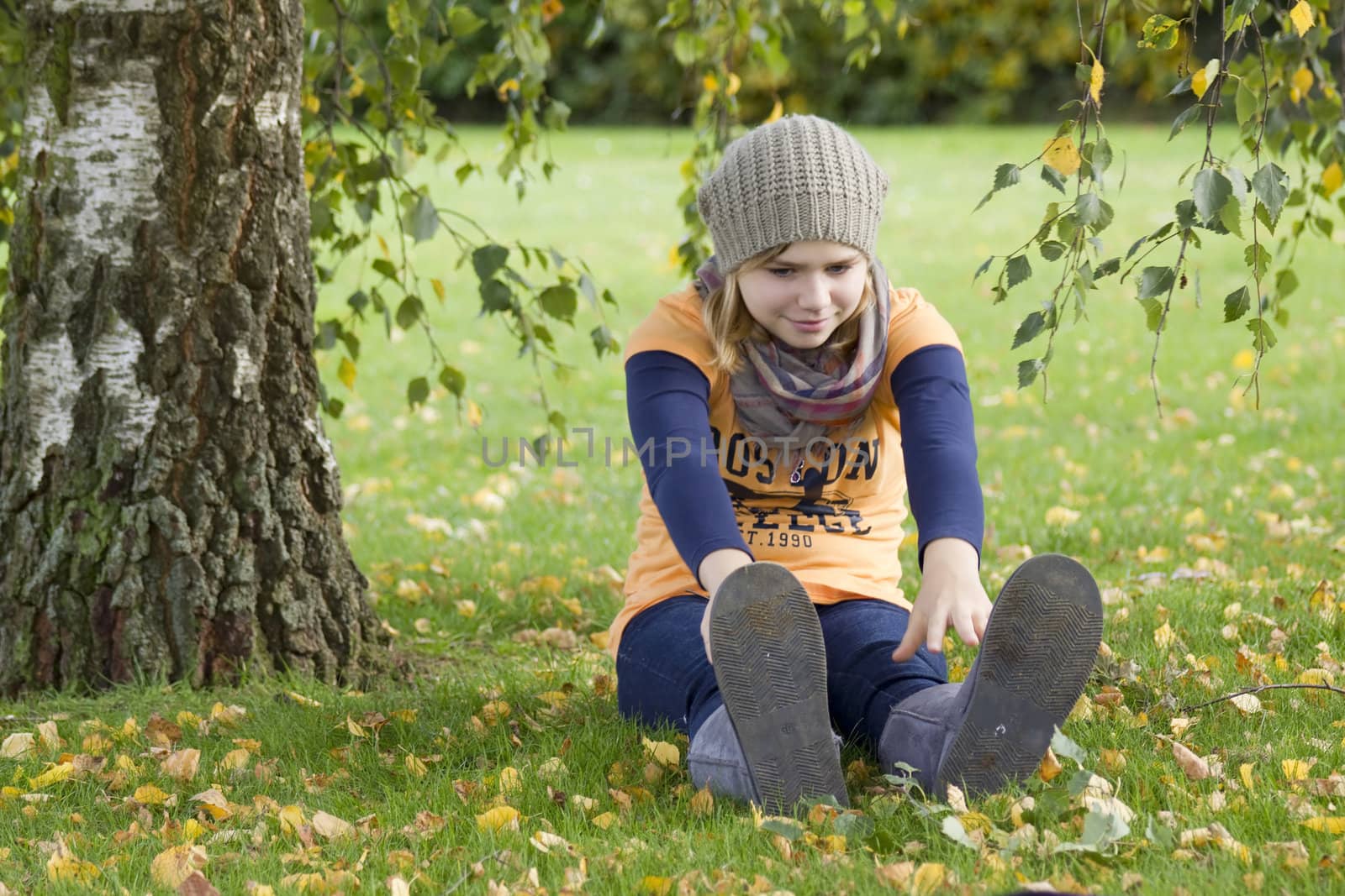 Cute girl playing in the park by miradrozdowski