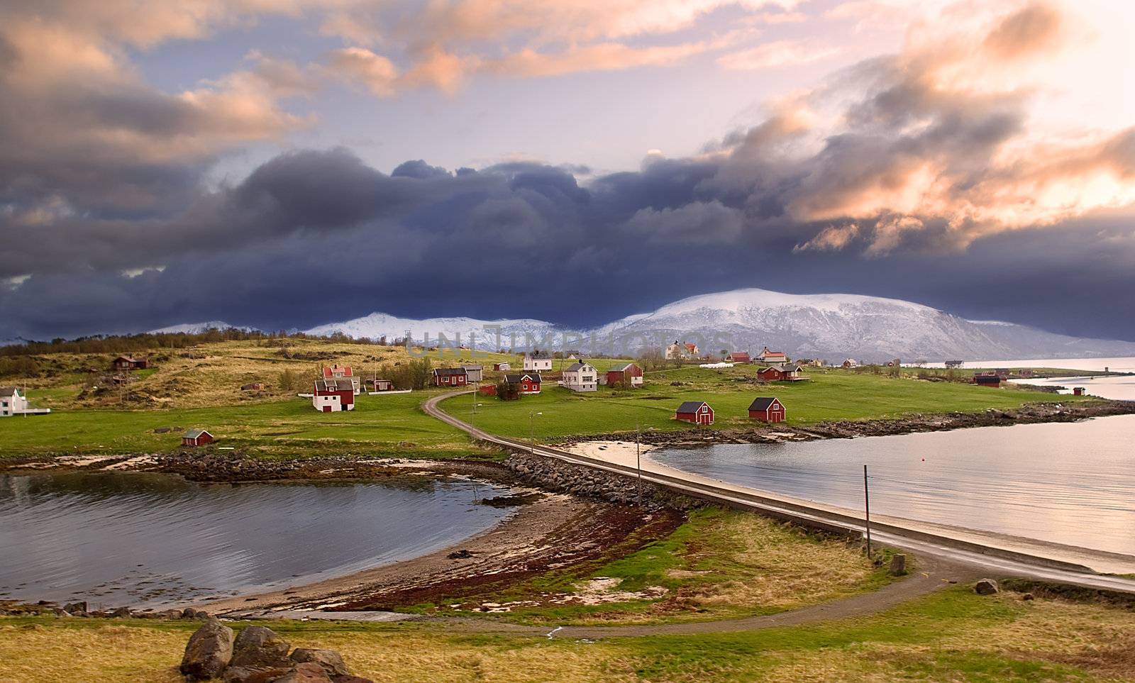 Norwegian village in the mountains with a gloomy sky
