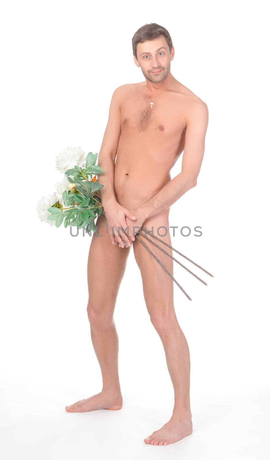 Cheeky implied naked man with Valentines or anniversary flowers holding his hands to his crotch and raising his eyebrow in a quirky gesture of defiance isolated on white