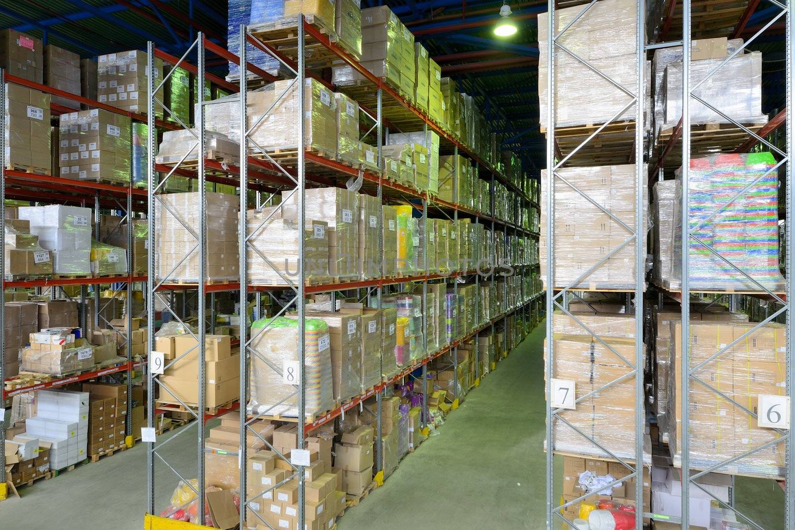 Indoor warehouse with lot of pallet. Wide angle photo.