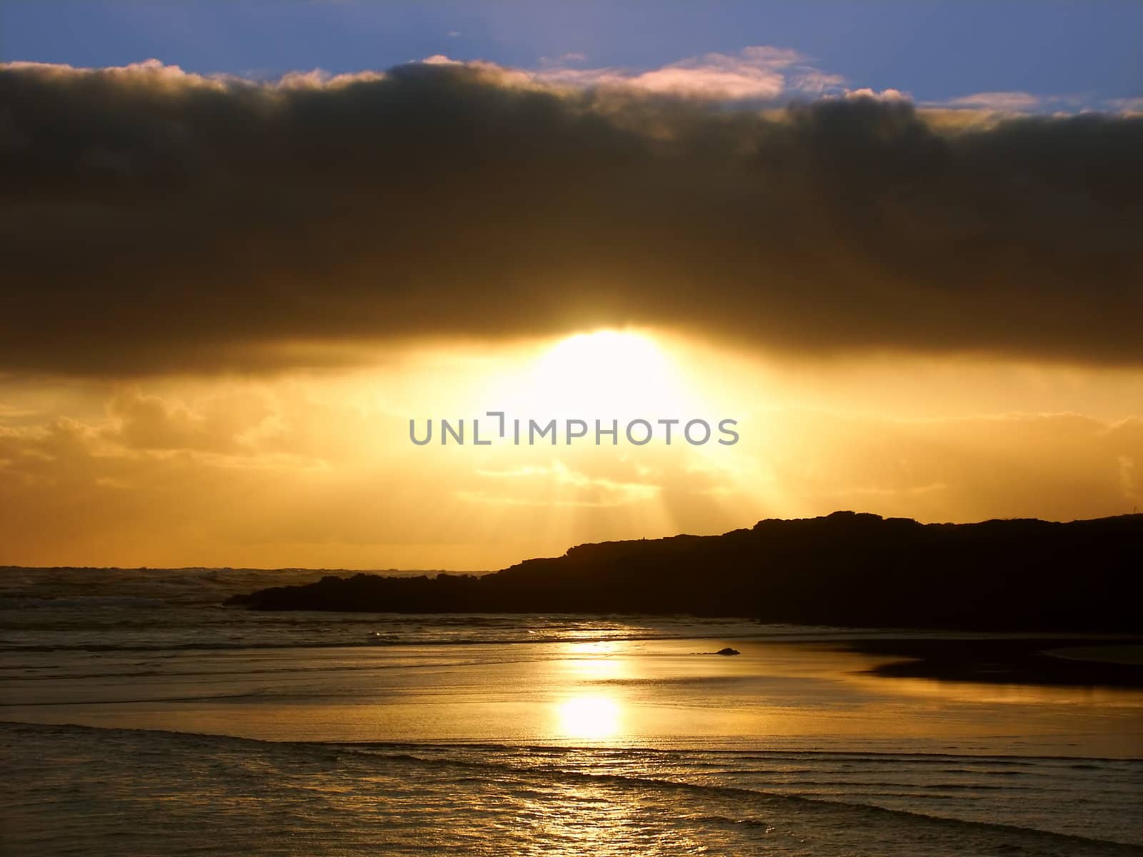 Sunset over the beautiful ocean coast at the city of Warrnambool in Victoria, Australia.