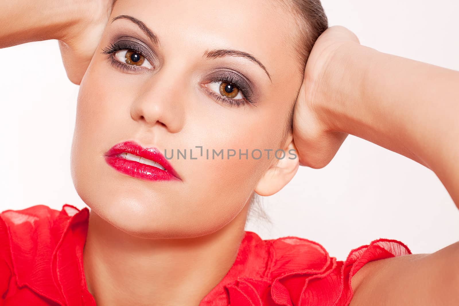 beautiful brunette woman with red lips and red shirt