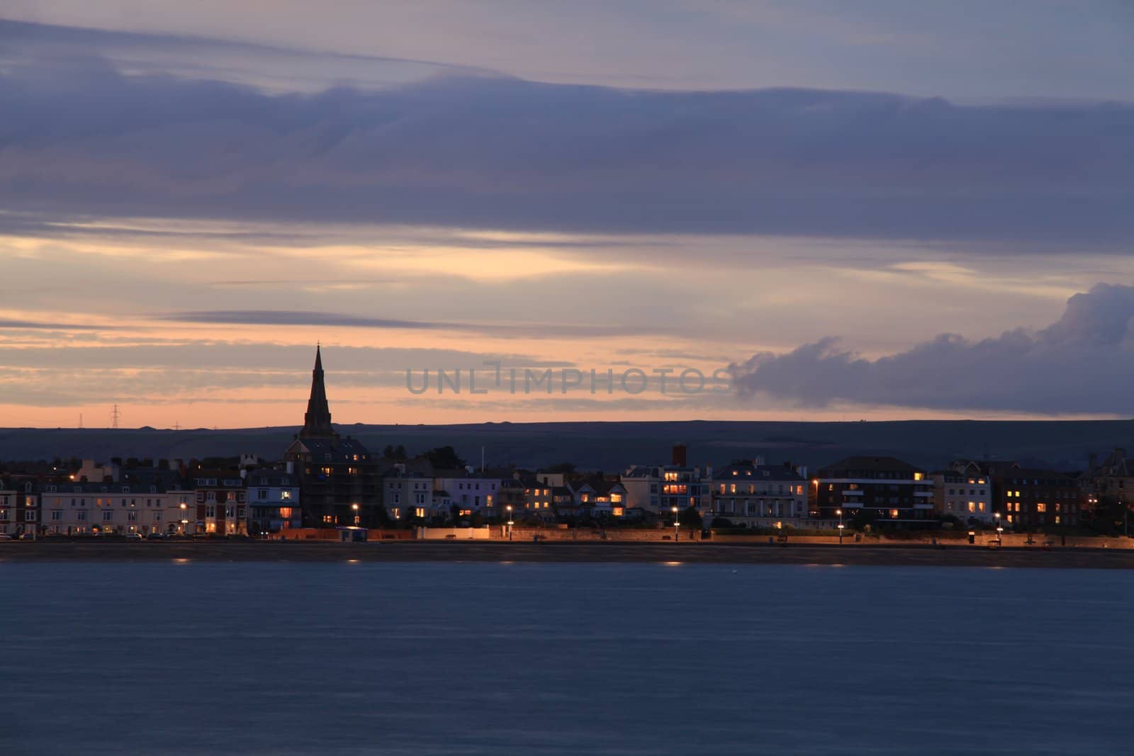 Dusk Weymouth seafront England by olliemt