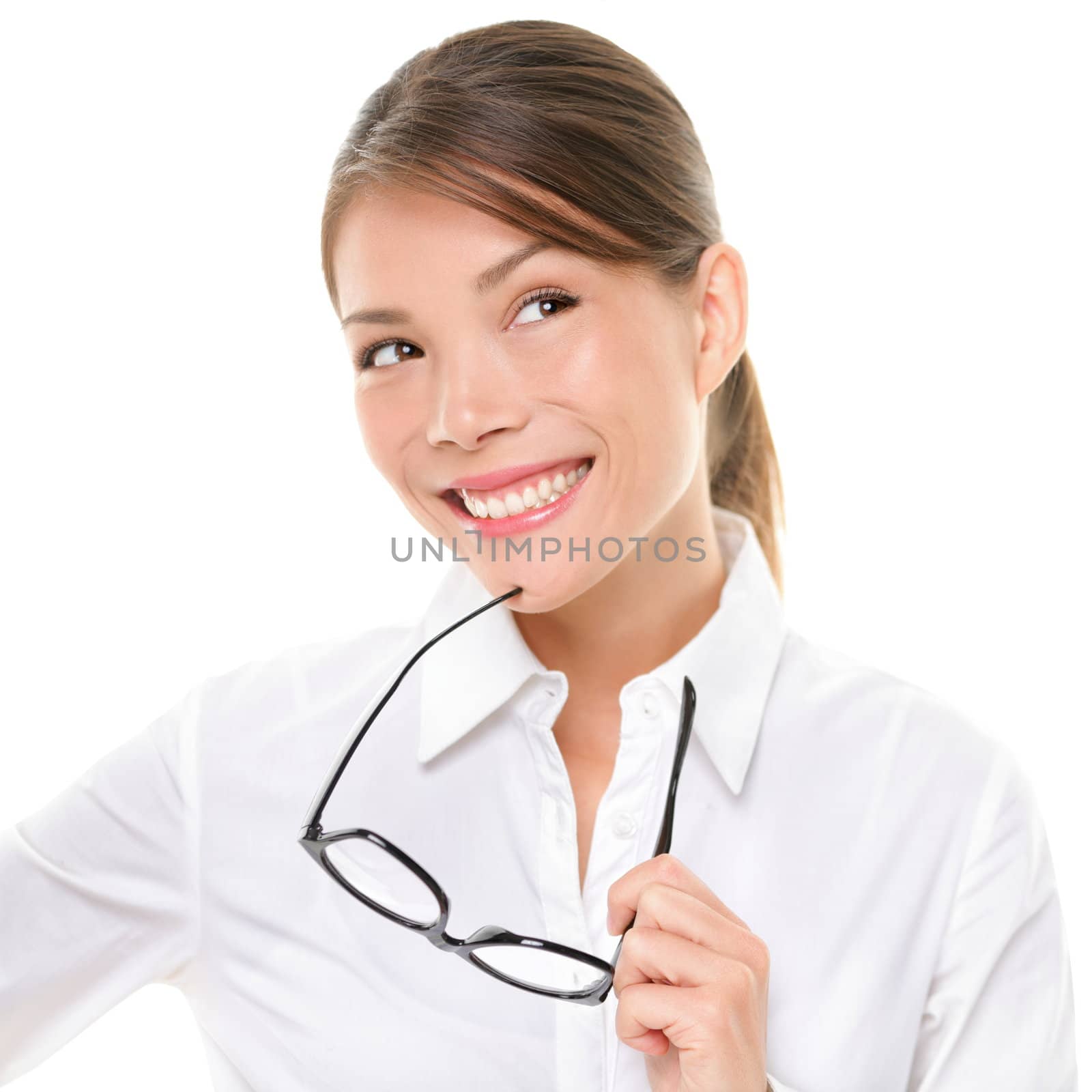 Excited woman looking sideways. Closeup of happy mixed race Asian Chinese / Caucasian female business woman isolated on white background.