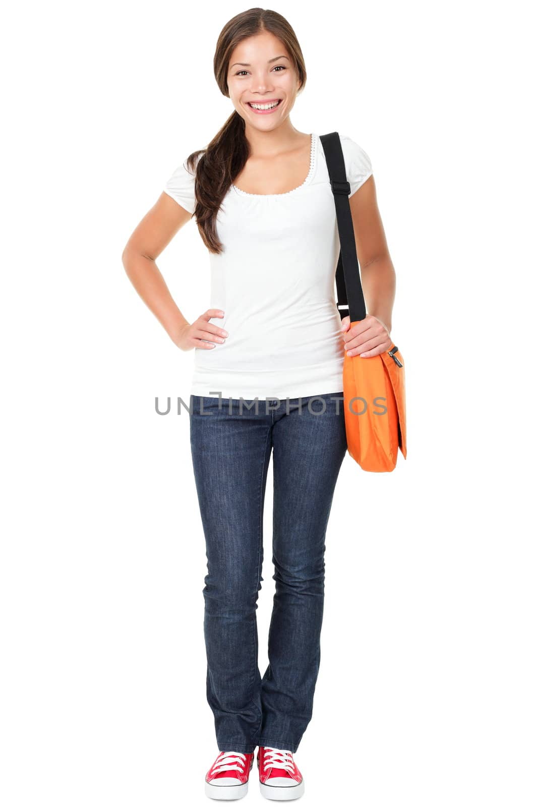 College university student woman. Happy smiling adult female student standing in full body length isolated on white background. Beautiful young multiracial Asian Chinese / Caucasian girl in her twenties.