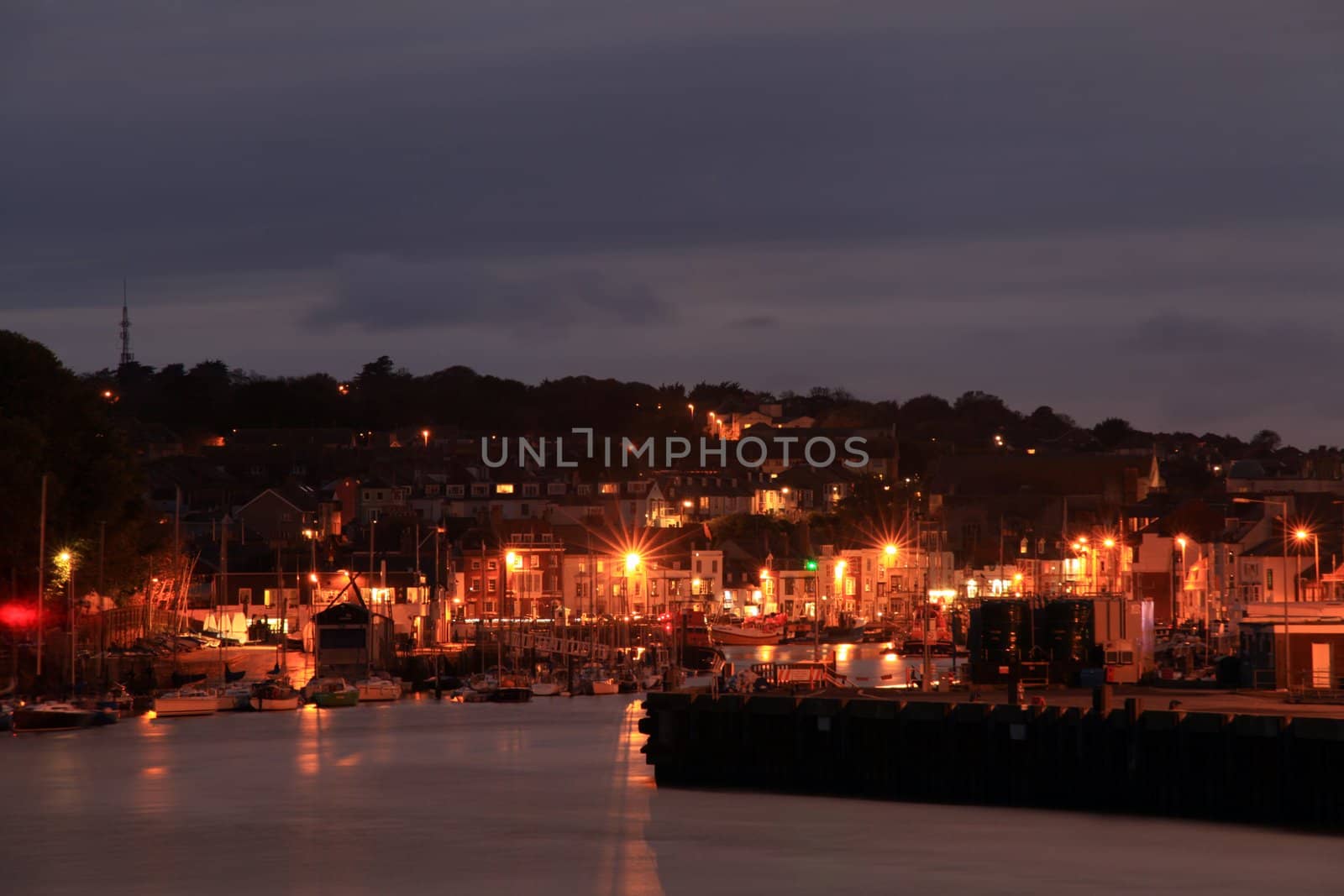 Harbnour at night in weymouth dorset southern Britian