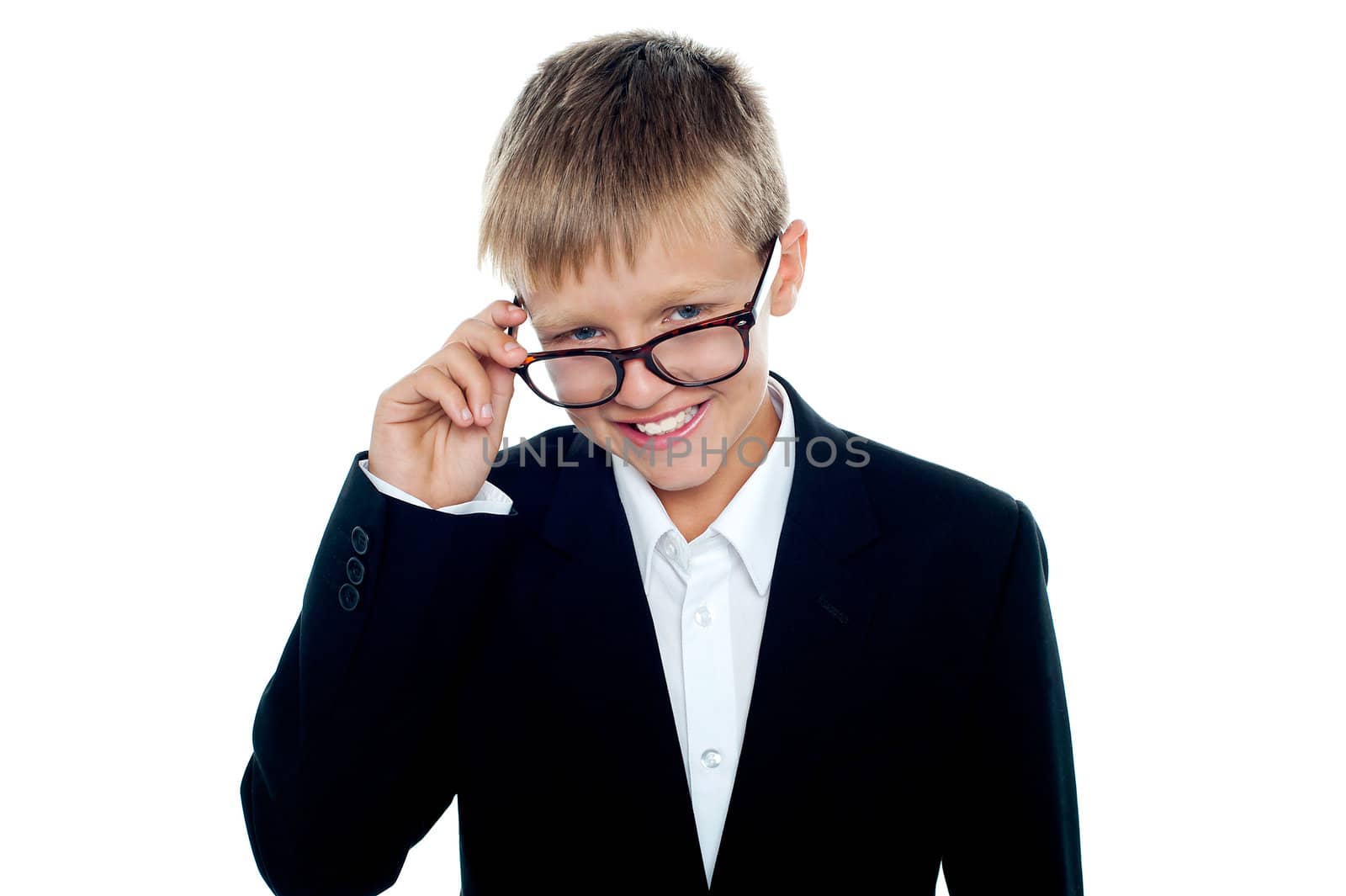 Young business boy looking through his glasses. Taking a closer look