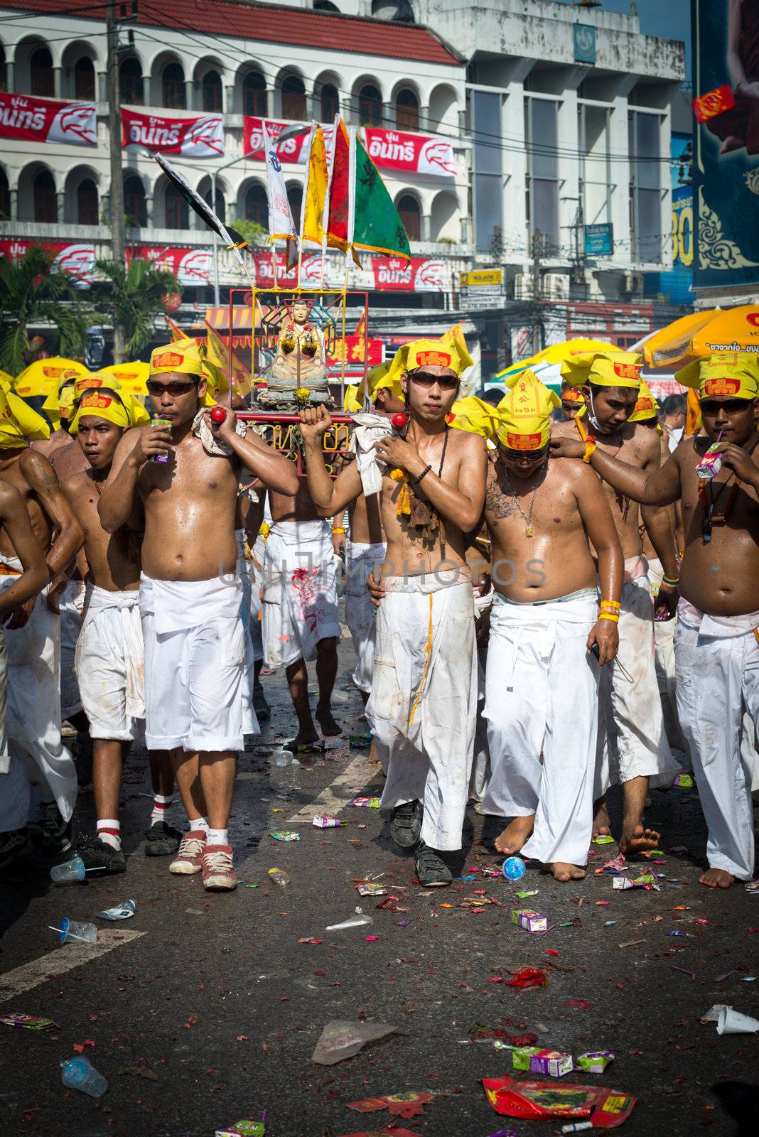 Phuket, Thailand - October 21, 2012: An unidentified people on street processions of Phuket Vegetarian Festival. It is an annual event held during the ninth lunar month of the Chinese calendar. 