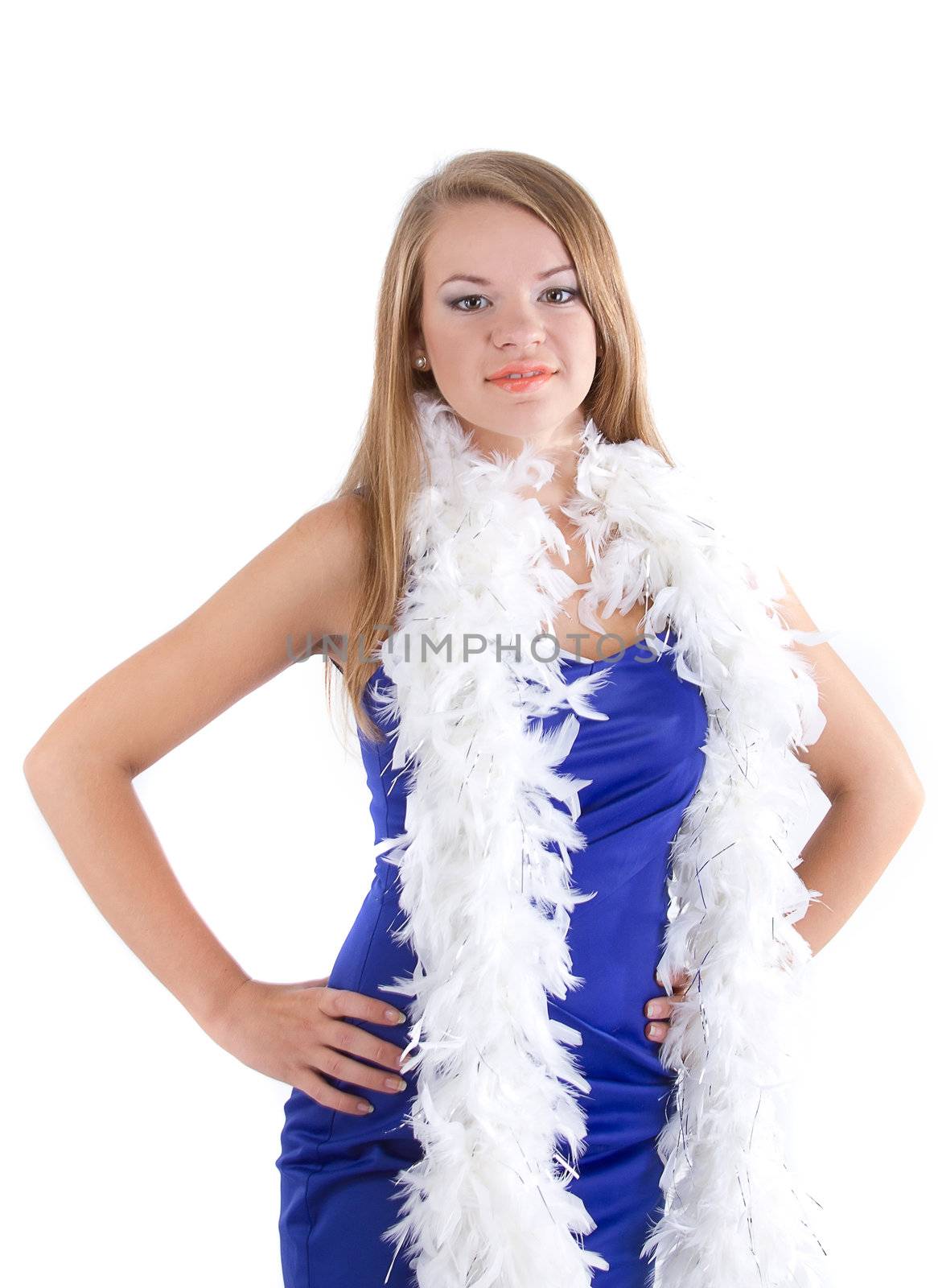 woman in her blue dress with her white feathered boa around her with a smile on her face