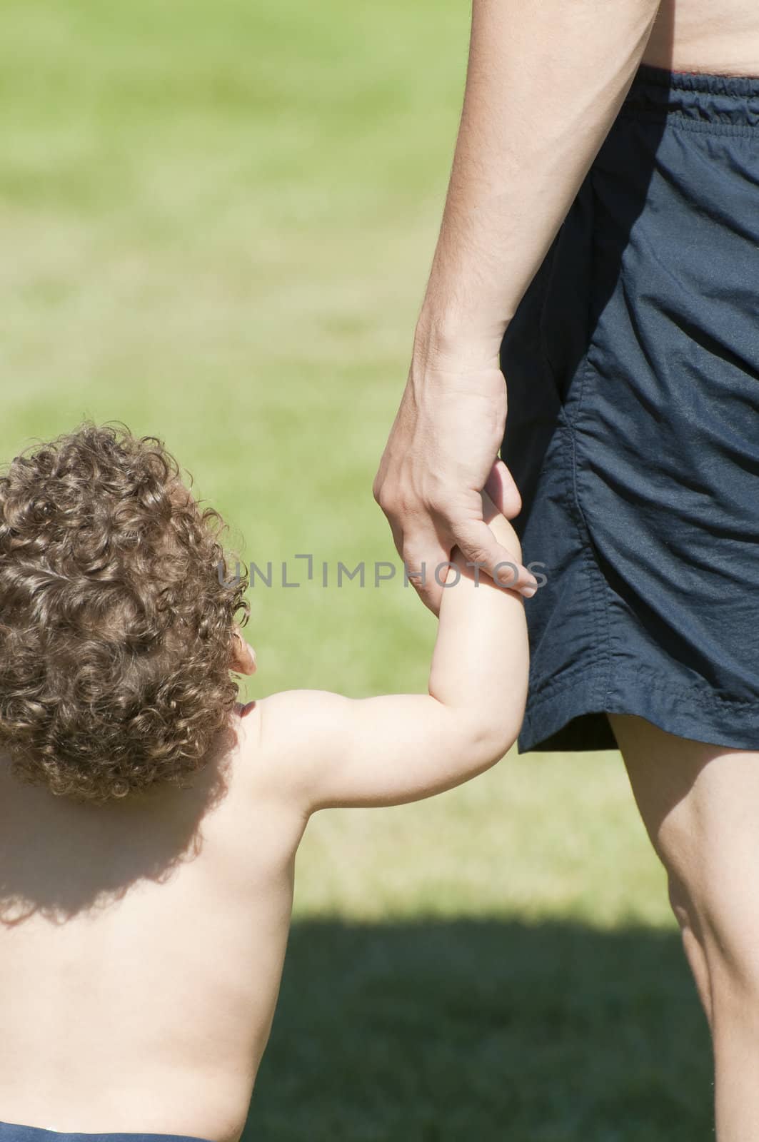 beautiful blond boy with his father