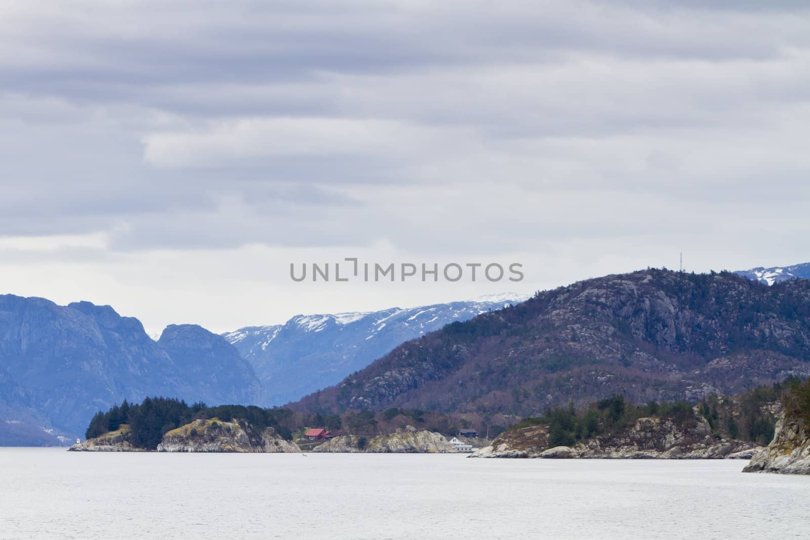 landscape in norway - coastline in fjord with islands
