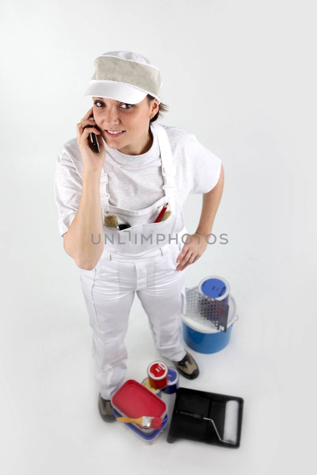 Female painter on the phone by phovoir