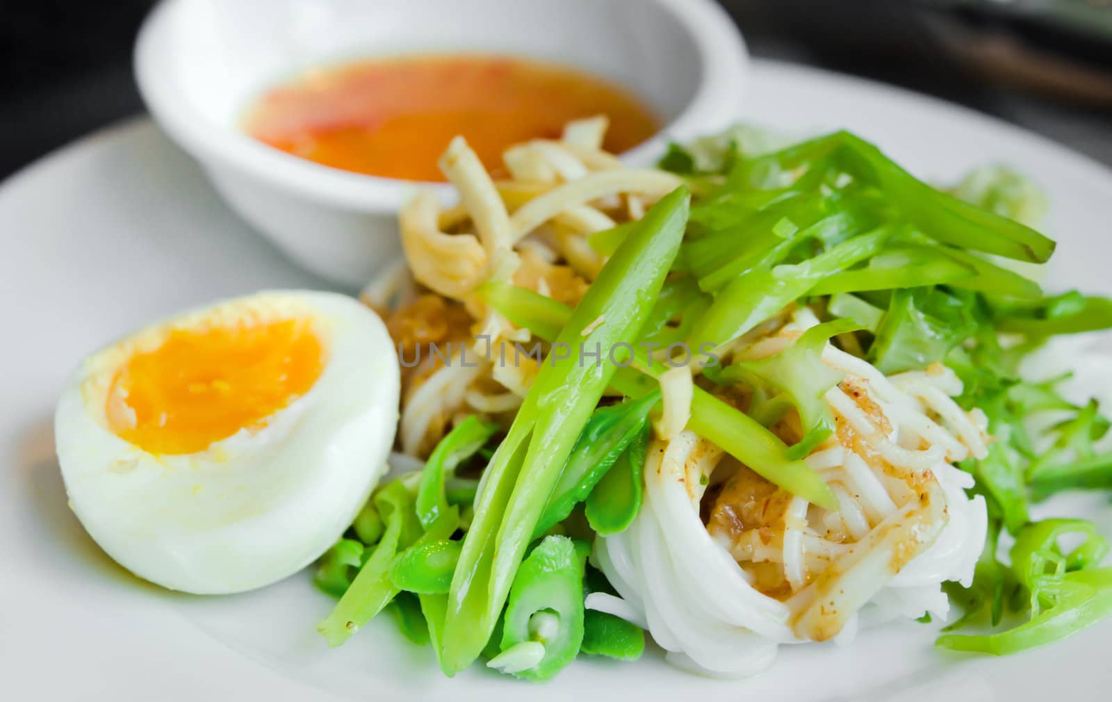  rice vermicelli served with boiled egg,  vegetable  and sweet sauce