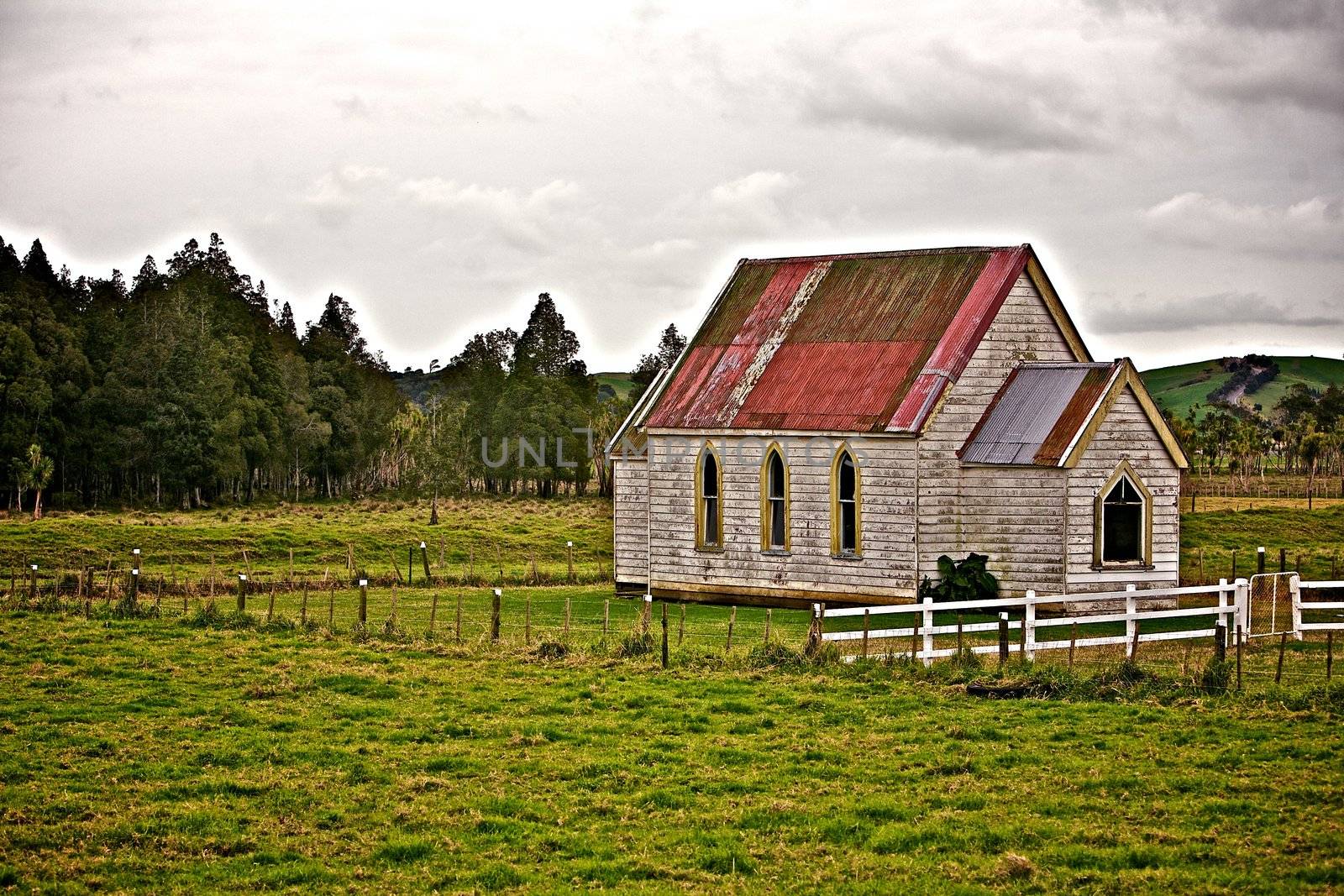 A Historic Weathered Church in the Field