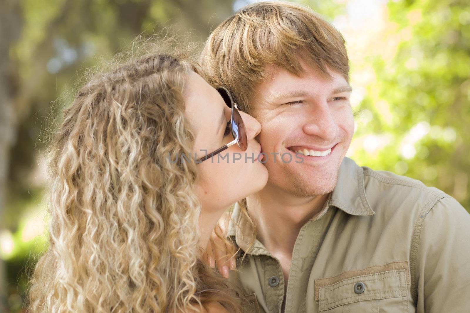 Attractive Loving Couple Portrait in the Park by Feverpitched