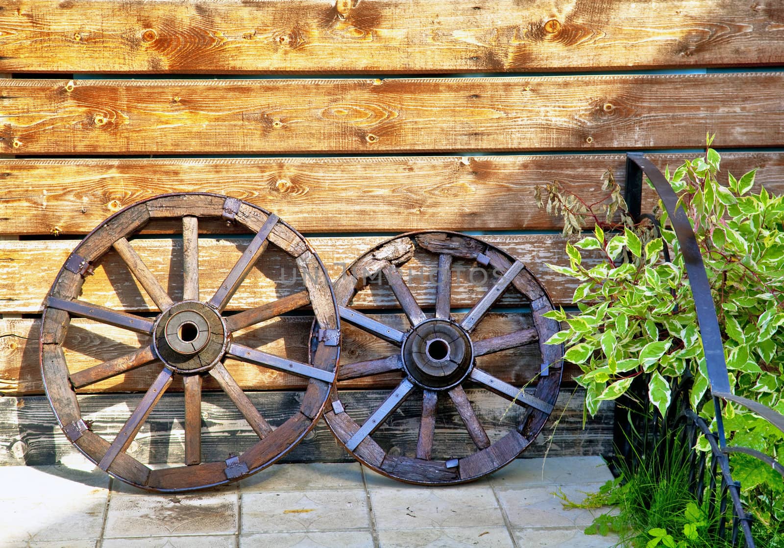 old wooden cart with grass on title base, gardening idea