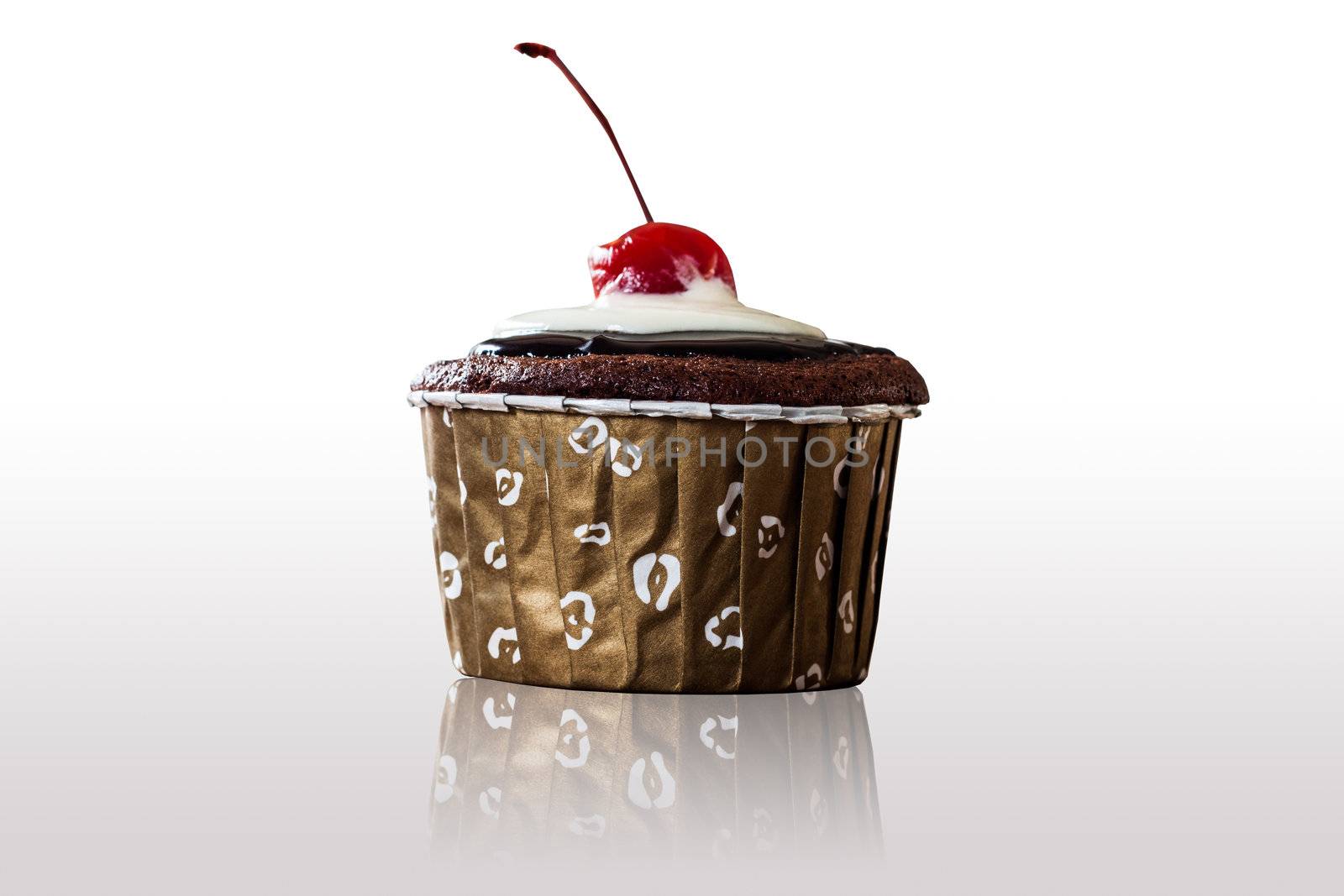 Chocolate  Cupcakes decorated with red cherry on isolated