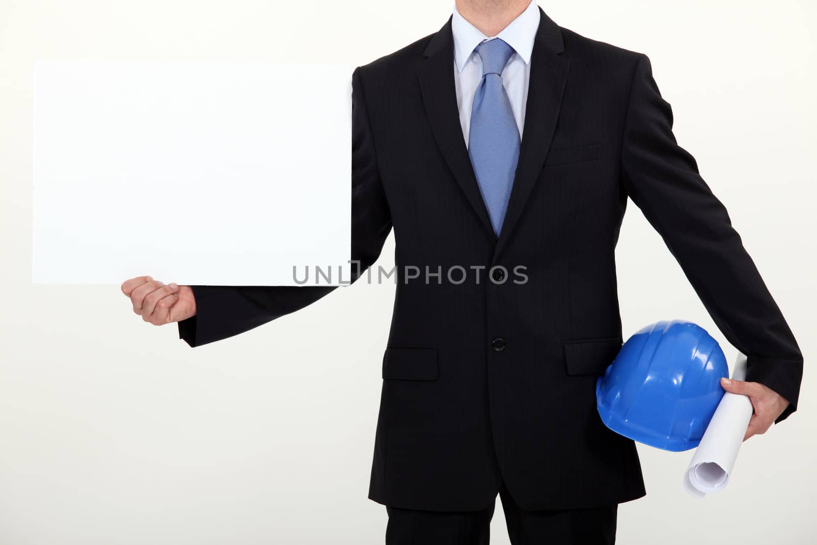 Engineer with a board left blank for your message by phovoir