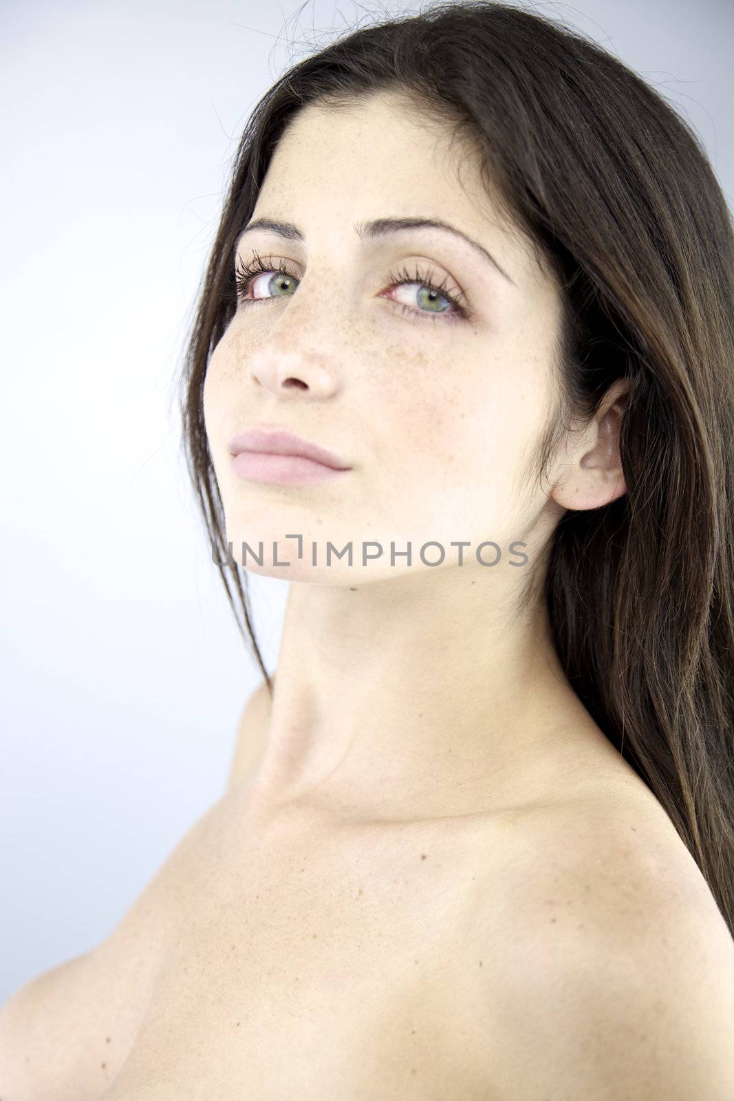Beautiful naked lady looking seriousGorgeous naked woman with green eyes by fmarsicano