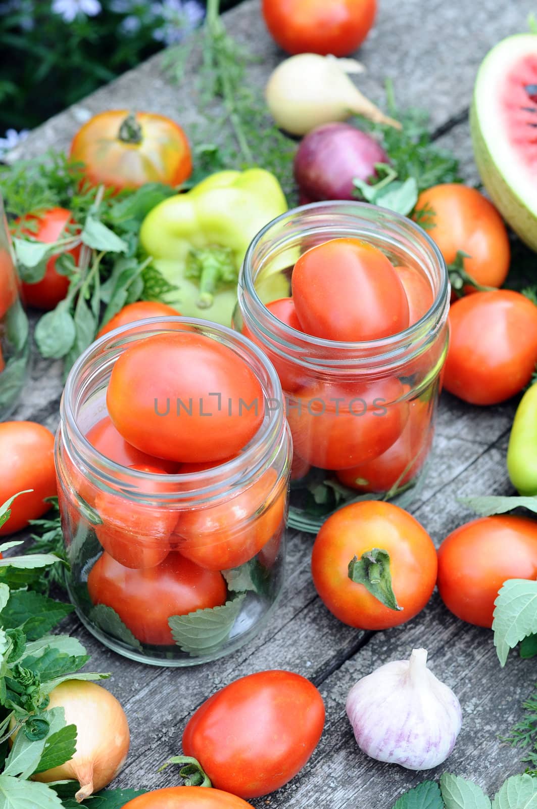 Canning tomatoes at home by olgavolodina