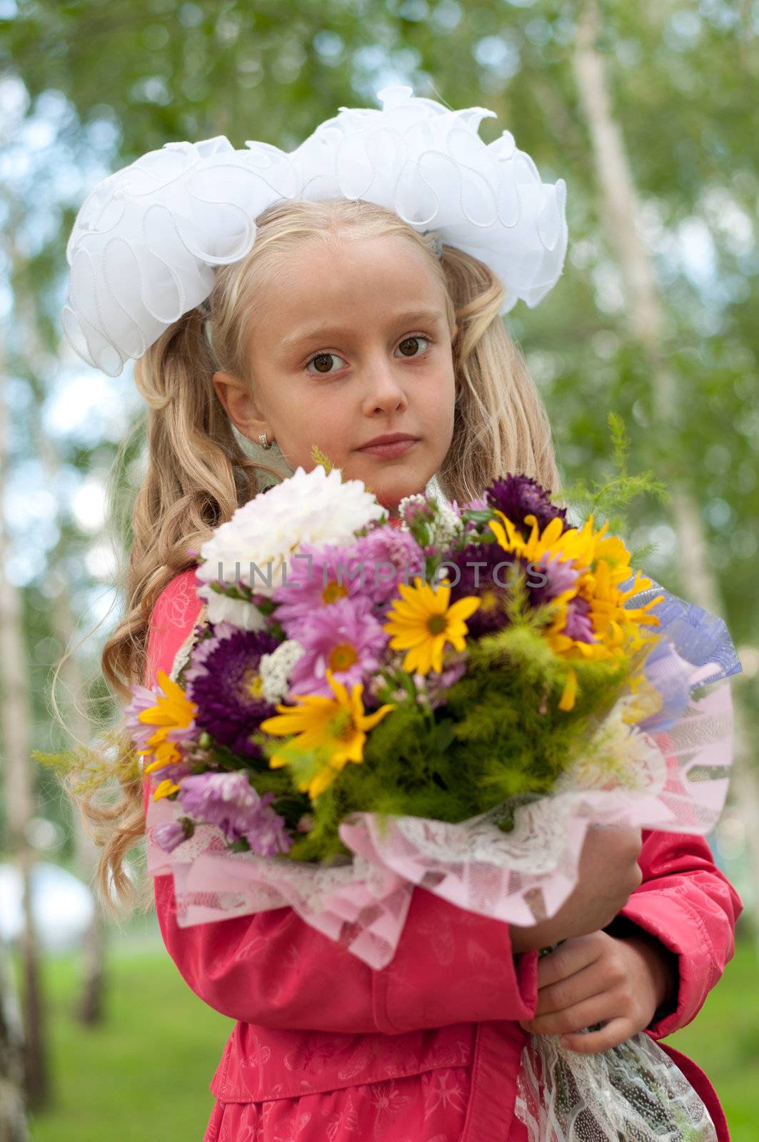 Schoolgirl dressed with a bouquet by olgavolodina