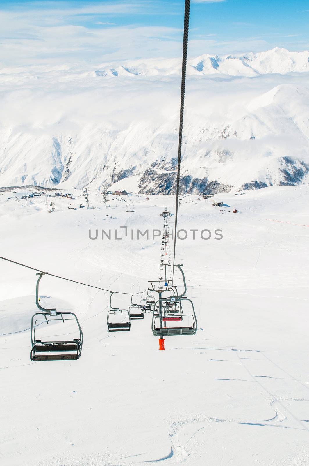 Skilift on bright winter day by Elnur