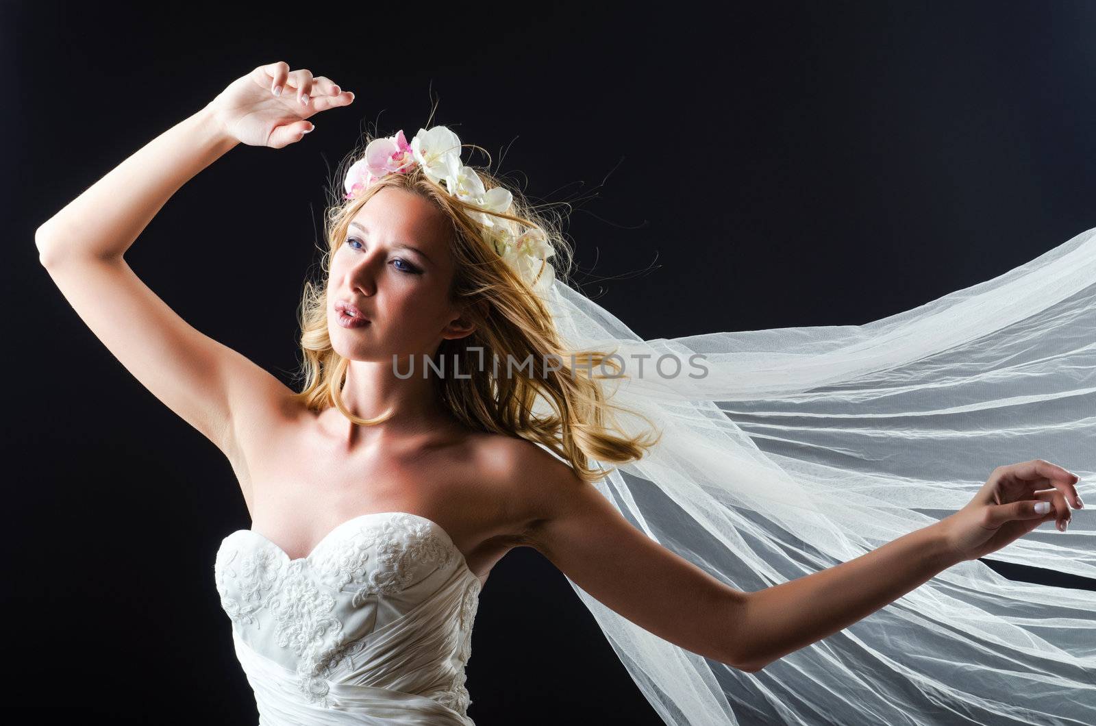 Bride in white dress in studio